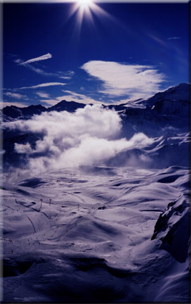 Valleys of cloud and pristine snow entice the winter sports enthusiast